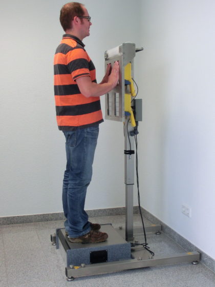 A man using an emergency contamination monitor